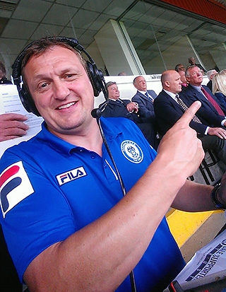Rochdale AFC's Stuart Ashworth points to Sir Alex Ferguson sat watching in the Spotland stand