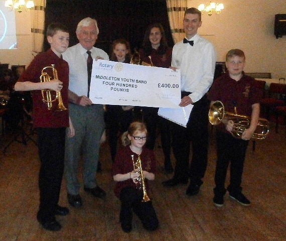 Band members with Rotarian John Brooker and Jamie Wade. Left to right Lewis Wrigley, Ellie Warren, Rebekah Harrison and Kameron Starrs. Front: Mollie Edwards