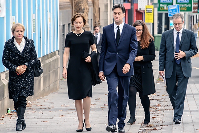 Ed Milliband and his wife Justine arriving for Jim Dobbin's funeral