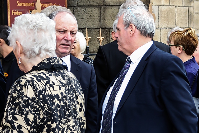 Councillor Richard Farnell (right), leader of Rochdale Council, arriving for Jim Dobbin's funeral