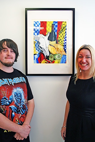Christopher McHale with his art and Joanne Hill from Forster Dean