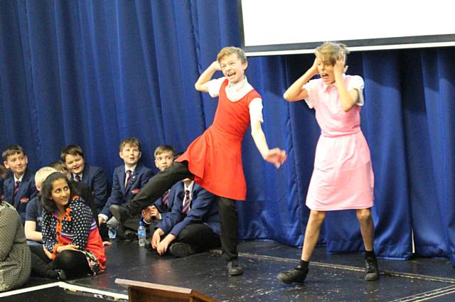Bringing poetry to life from left Dominic Pratt, 12, and Bailey Antrobus, 12, act out I’m sick in front of Year 7s at Whitworth Community High School