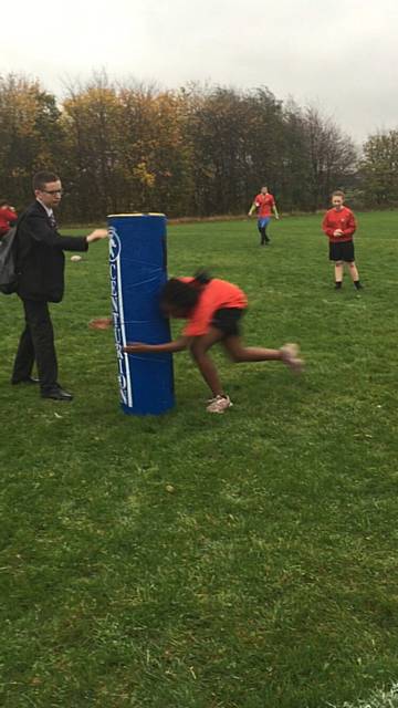 St Cuthbert's RC High School Year 10 girls taking part in rugby training
