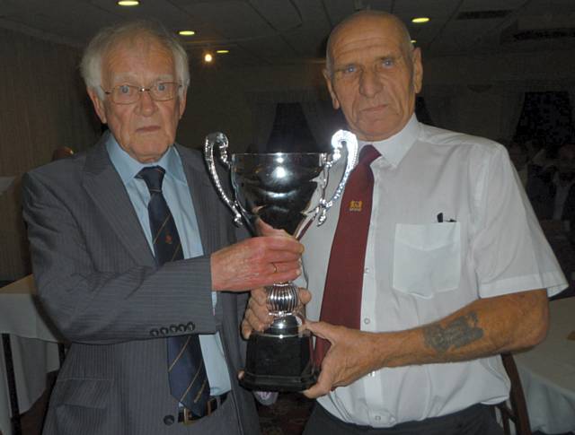 David Shepherd with Mel Whittle of Crompton won the Clifford Pickup Memorial Trophy as leading wicket-taker