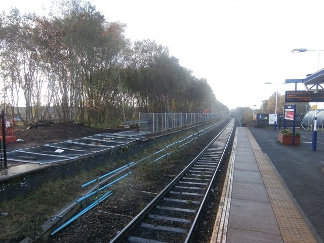 Trees being removed to allow the Manchester track to be moved across, to make way for new points and track into the bay platform. 
