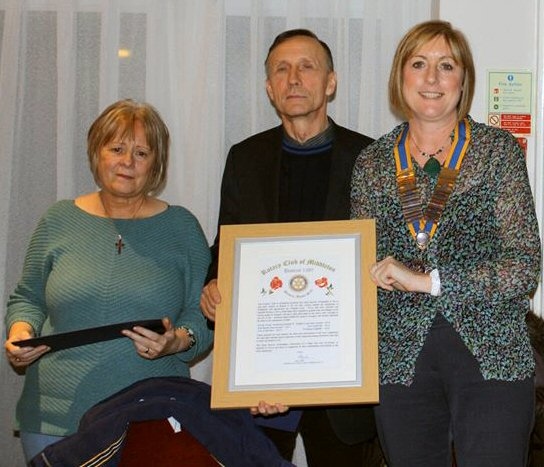 Sue and Terry Smith with The Rotary Club of Middleton President Sue Furby and their Rotary ‘Paul Harris Fellowship’ Award