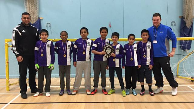 Heybrook Primary School 5-a-side football team: Umar, Mohib, Yaqoob, Ismail, Yasin, Timmy and Hassan with Mr Hussain and Mr Gregory 