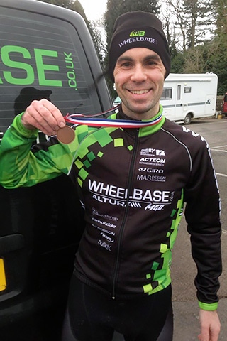 Lewis Craven with his medal