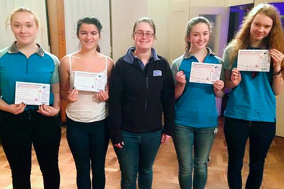 District Commissioner Gemma Orr (centre) presents Alyse Costello, Rachel Lopresti, Estelle Riley and Kimberley Taylor with the Baden-Powell Challenge Award