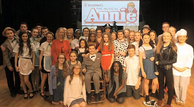 The cast in 'Annie', backstage support, front of house, staff and musicians & Liz McInnes MP 