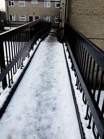 Residents feel 'trapped' because Green Vale Homes have not gritted walkways at Tong Lane flats