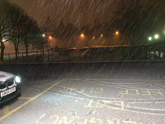 Snow falling on Rochdale last night