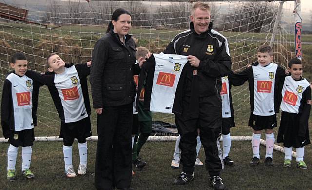 Kirsty Williamson with Wardle Juniors FC and Richard Fielding