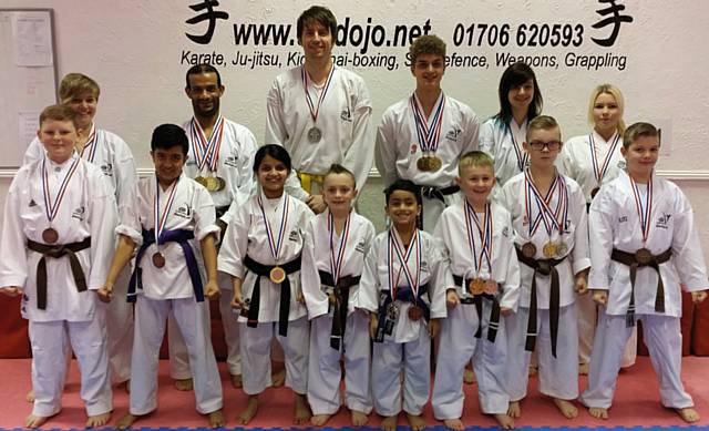 14 members of The Dojo with 24 Medals from Midland Open Karate Championships 