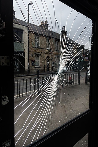 Window damaged at a Boutique