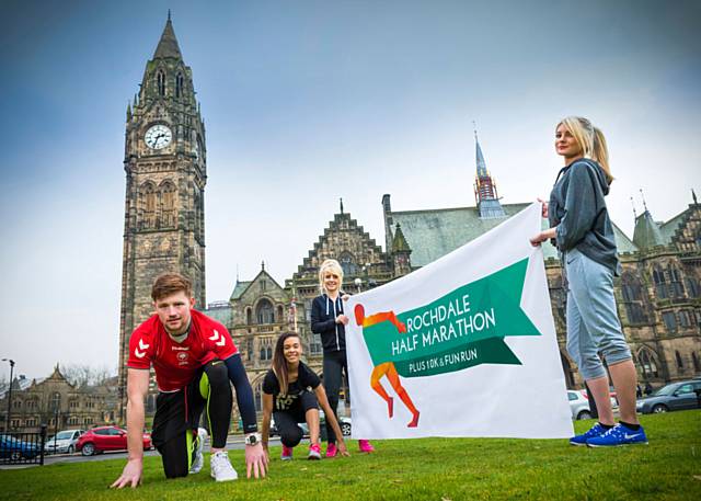 Fitness Academy students Alex Jobson, Tricia Roberts, Lizzie Gamwell and Madison Stotthard at the town hall during the launch of Rochdale half marathon, 10K and fun run