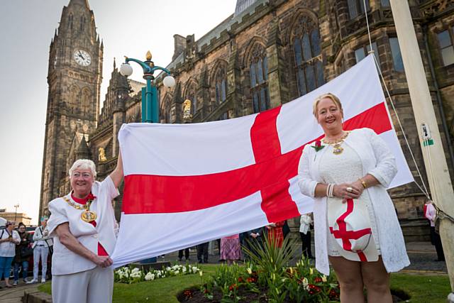 The Mayor Carol Wardle and Mayoress Beverley Place raise the flag to celebrate St George’s Day