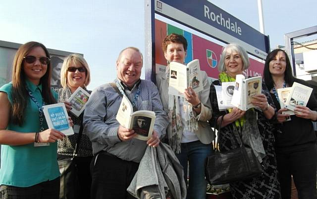 Library staff at Rochdale Train Station on their way to distribute paperbacks to commuters, promoting World Book Night