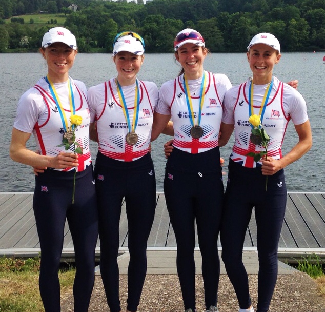 Brianna Stubbs, Ruth Walczak, Emily Craig and Eleanor Piggott smiling with delight after their win in the lightweight women’s quad in Essen, Germany