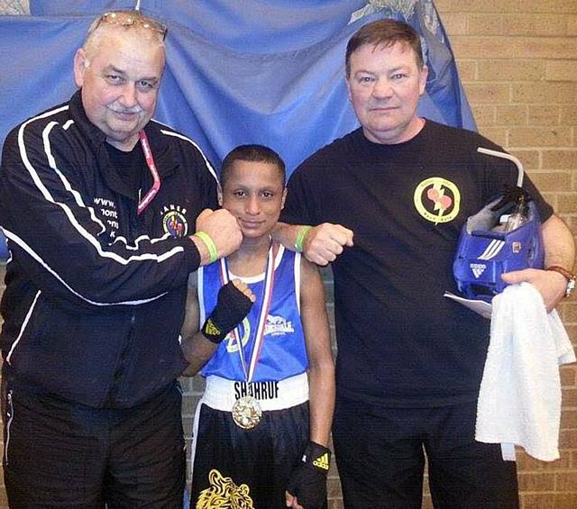 Shahruf Ali with Hamer coach Alan Bacon (left) and Steven Connellan (right)