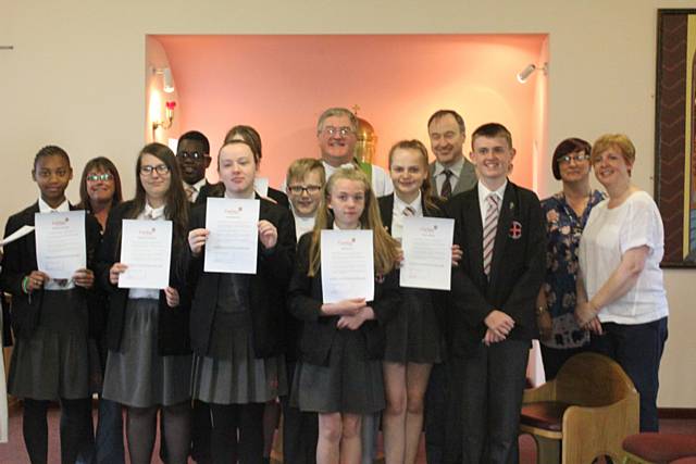 St Cuthbert’s pupils who were commissioned as Caritas Ambassadors in a service in our chapel by Fr David Glover, Episcopal Vicar for Social Responsibility