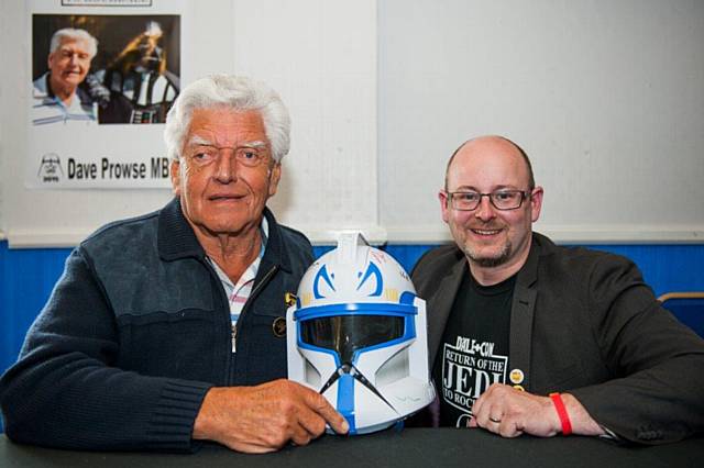 Darth Vader, Dave Prowse MBE, presents Martin Ballard with the signed Clonetrooper Helmet