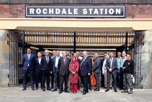 Representatives of Transport for Greater Manchester; Network Rail; Northern Rail and Rochdale Council at the new station entrance on Miall Street