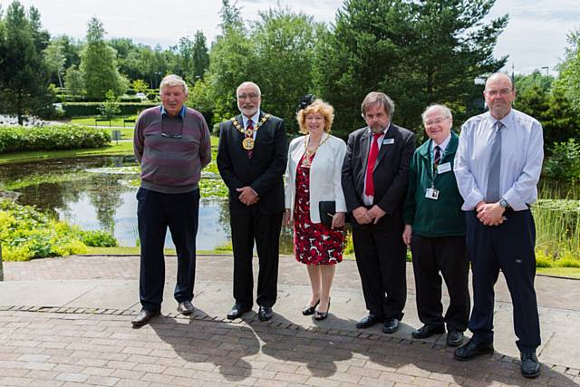 Rochdale in Bloom judges gather at Zen’s pond – a haven for local wildlife