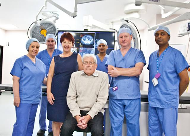 Sr. Susan Longden, Sister in charge of vascular theatres; Dr Simon Chadwick, consultant vascular anaesthetist; Sr. Susan Ashworth, theatre manager; Riza Ibrahim, clinical director of vascular surgery; Tim Barrett, chief radiographer and Dr Ranjeet Narlawar, consultant radiologist with patient Christopher Walsh