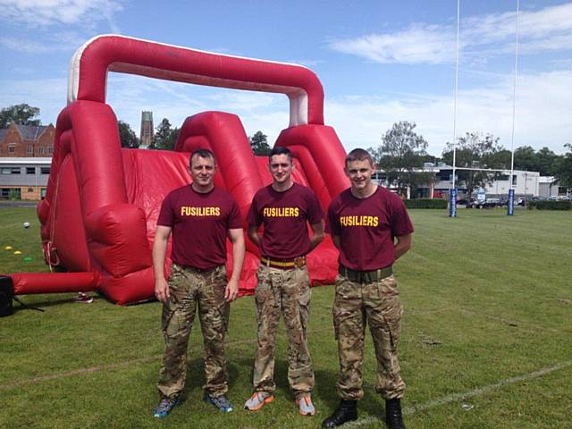 The Fusiliers in front of the obstacle course 