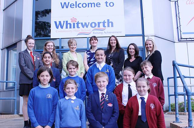 Celebrating success: Headteachers and students of Whitworth’s primary schools and high school celebrate all schools in their area being good or outstanding.