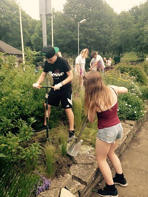 Lily Pearson and Aiden Kirkbride working hard on the gardening project