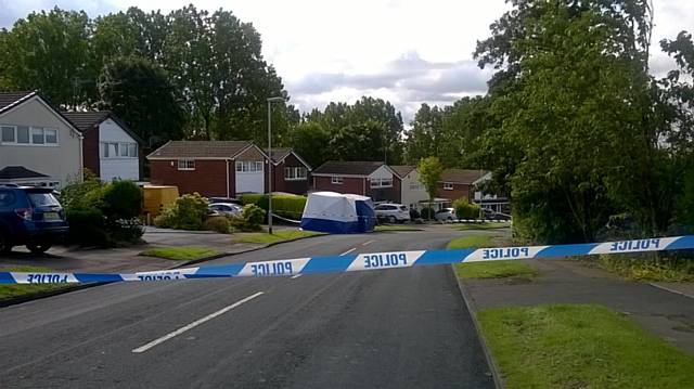 Woman died following stabbing on Shawclough Way, 2 men arrested