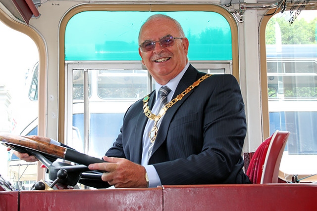 Deputy Mayor of Rochdale, Councillor Ray Dutton behind the wheel of one of the Yelloway coaches