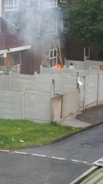 Builders continue their work and light fires on Pembroke Court, despite being told to stop