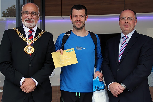 Third place in the Rochdale Half Marathon Dave Norman collects his prize