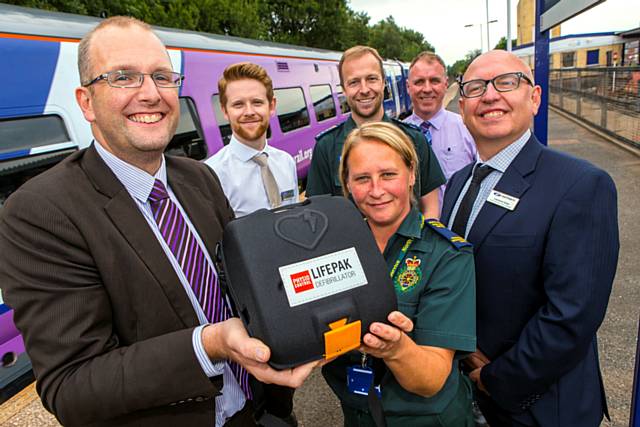 Stephen Green (Compliance Delivery Manager for Northern), Simon Brooks (Station Manager for Northern), David McNally (Community Resuscitation Manager, NWAS), Lisa Stanway (Community Resuscitation Training Officer NWAS), Rod Hassall (Customer Service Advisor, Northern) and Lawrence Jones (Health and Safety Advisor for Northern) at Rochdale station