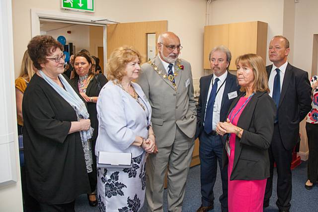 Mayoress Cecile Biant, Mayor, Surinder Biant and Simon Dancuzk, MP for Rochdale tour the building with Jill Nagy, CEO of Rochdale Training 