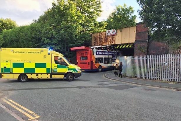 Bus crashed into the railway bridge between Joshua Lane and Mills Hill Road in Middleton