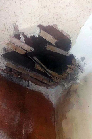 Collapsed ceiling in disabled child's bedroom 