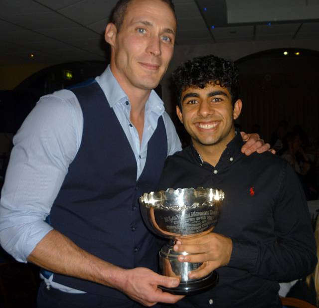 Simon Jones presented Rehan Udwadia with the Pennine League under 21 player of the year trophy - Norden Cricket Club Annual Presentation Night