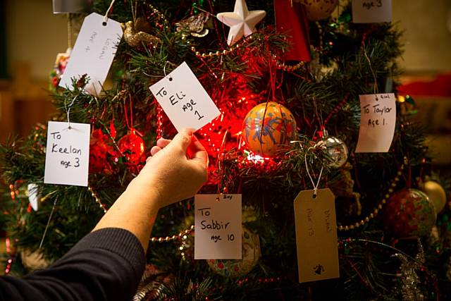 Petrus, has put more than 70 gift tags on a Christmas tree bearing the names of children who are unlikely to receive any presents this year - The idea is simple. Take a tag, buy a gift for a child 