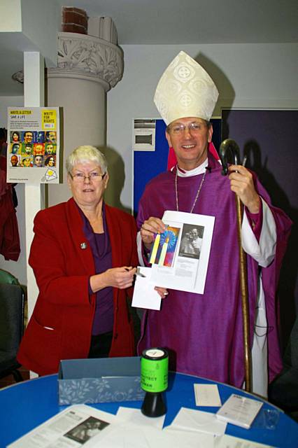 Jo Hill, of St Andrew's, a member of Amnesty International (Manchester) with The Rt Revd Mark Davies, Bishop of Middleton 