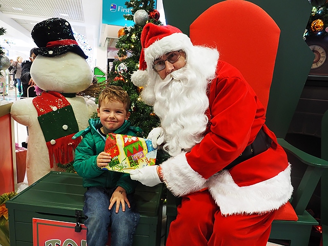Jesse Malone meets Santa in the Rochdale Exchange Shopping Centre Grotto