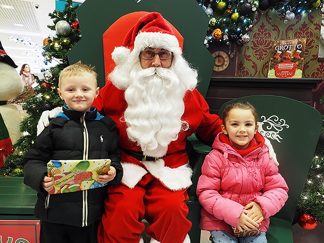 Children meet Santa in the Rochdale Exchange Shopping Centre Grotto

