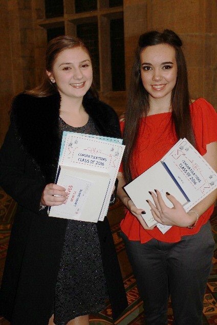 Laura Dawe and Katie Hardman-Elliott collecting their awards - St Cuthbert's Class of 2016 Honoured