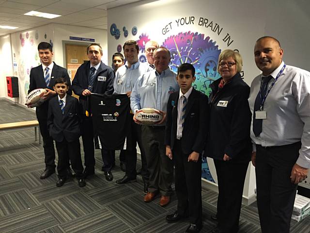 Representatives from TBA and Rochdale Hornets join pupils and teachers at Kingsway High School