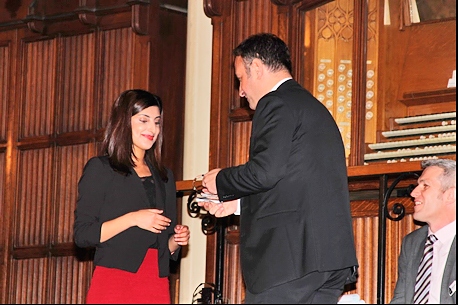 Farah Hussain receiving her Outstanding Contribution to College Life Award from college Principal Julian Appleyard
