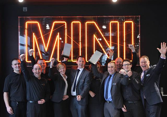 The winning team at Williams Rochdale Mini with Mini brand manager Lee Griffiths (centre)