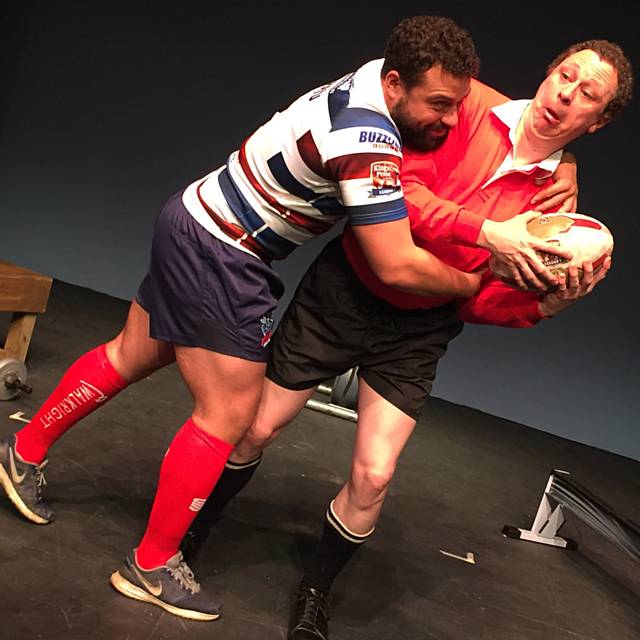 Rochdale Hornets player Michael Ratu rehearsing with 'Up N’ Under' cast at the Curtain Theatre